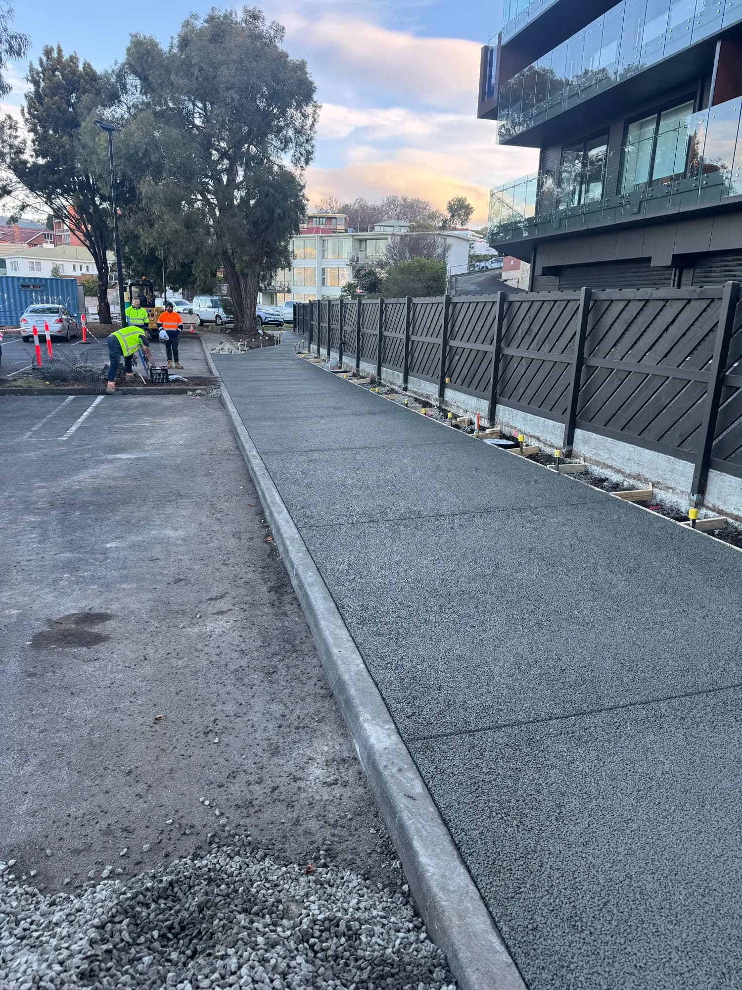 Hobart footpath section poured in permeable concrete, kerb detail