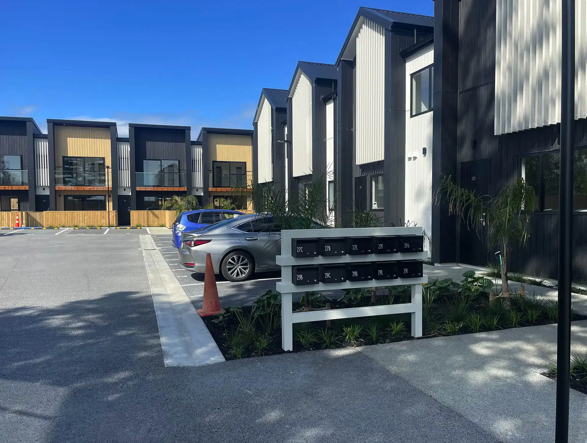 Permeable concrete parking court in a new residential development