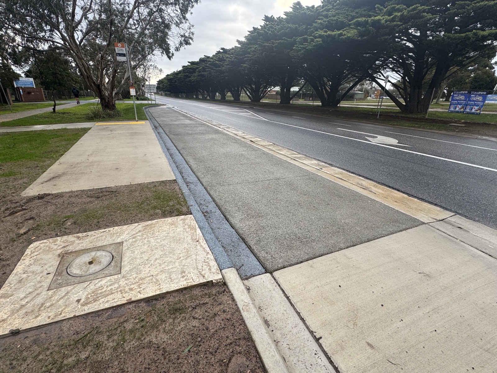 Permeable concrete bus stop hardstand and road shoulder on Mornington-Tyabb Road, Victoria