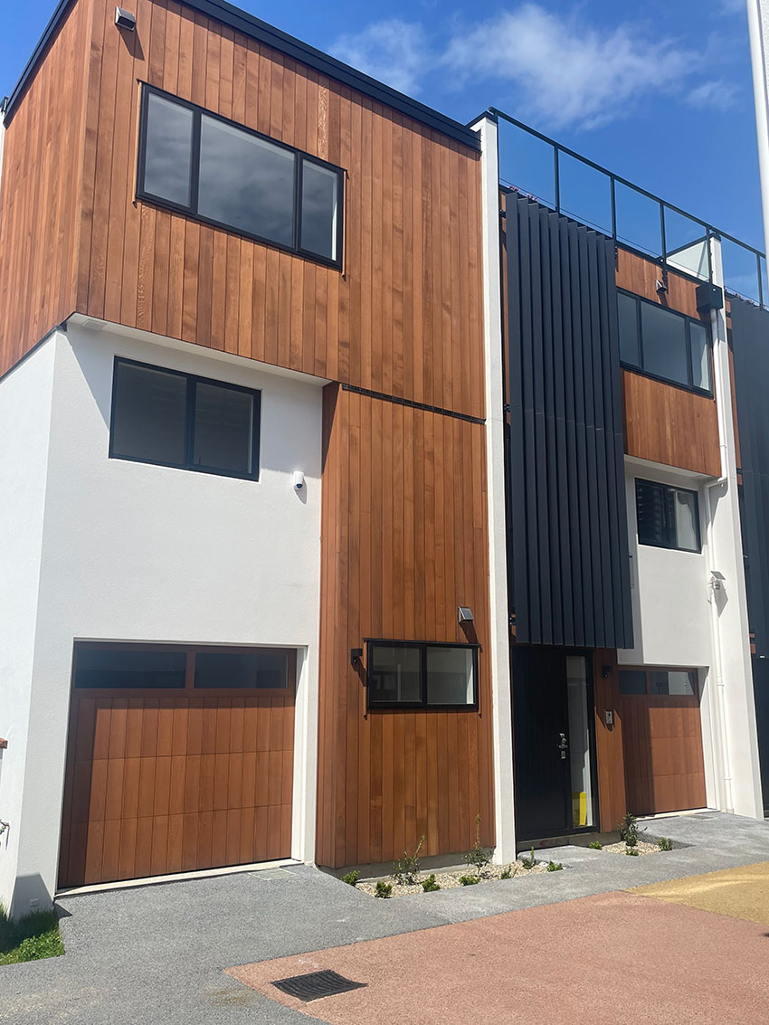 Newly installed permeable concrete driveway in front of a commercial building.