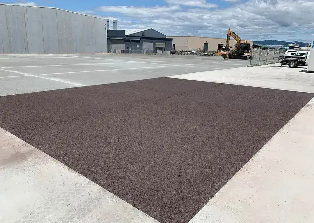Permeable carparks concrete section in an industrial parking area.